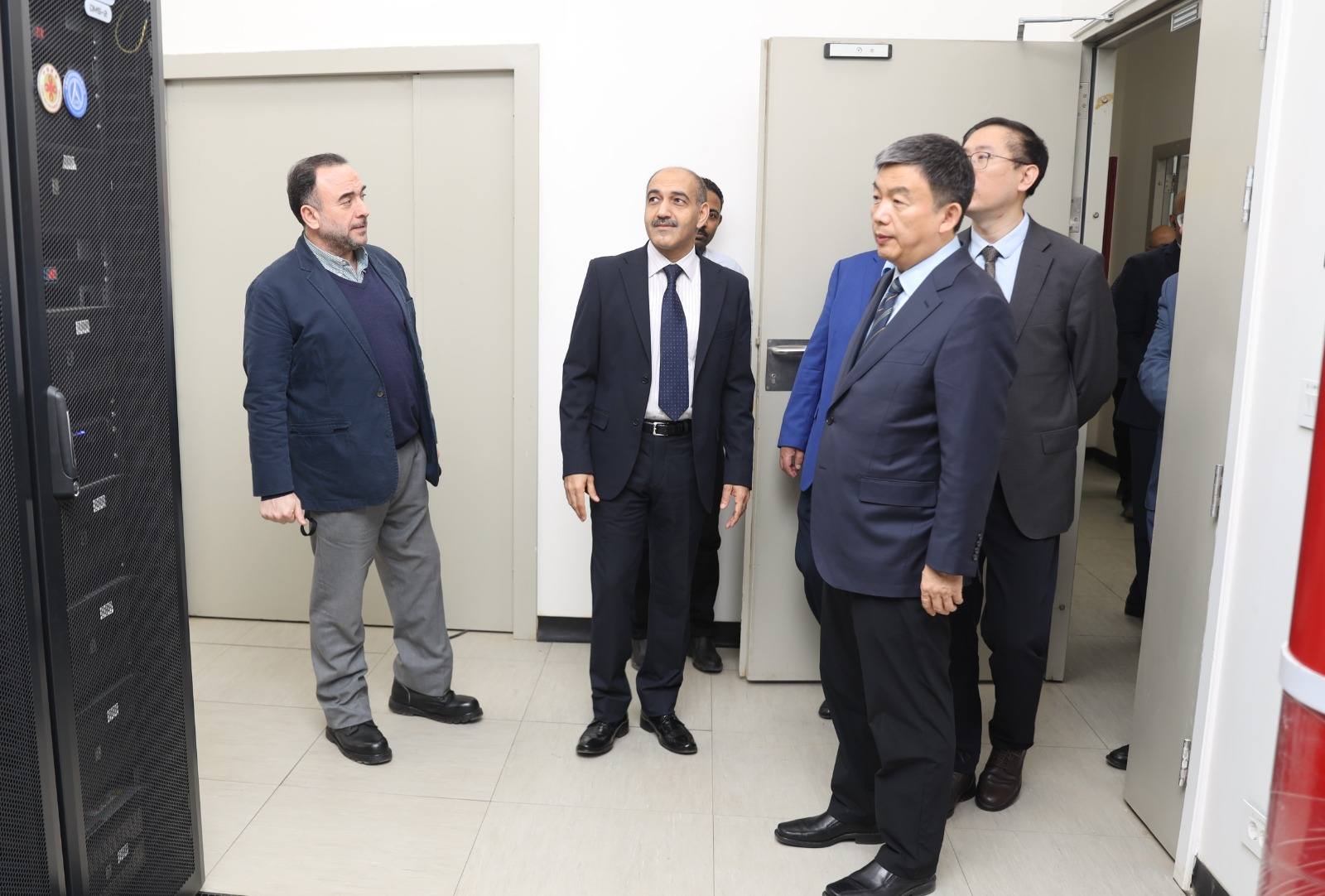 May be an image of one or more people and text